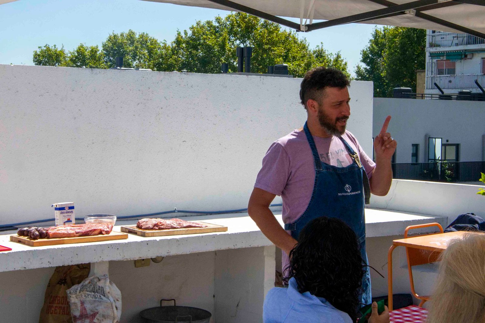 Experience the Sizzle of Rooftop Asado in Palermo